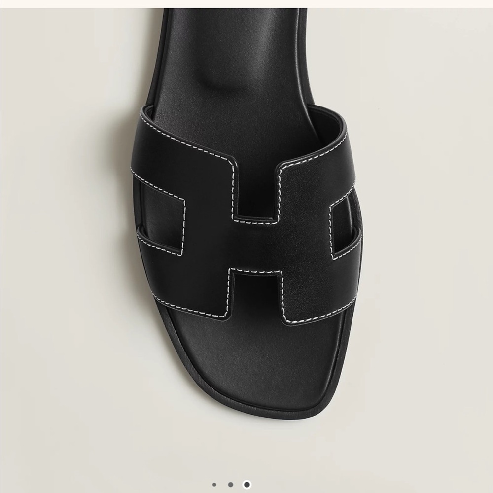 Authentic Hermes  Black Oran Sandals
Comes w/ Box, dust bags and receipt